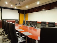Projection Screen and Long Conference Table